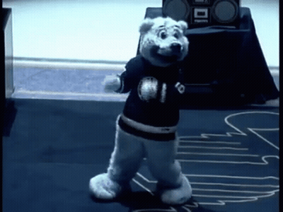Polar Bear Mascot Dancing In Front Of Radio GIF