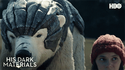 Polar Bear With Helmet Next To Woman In Red Hat And HBO Logo GIF