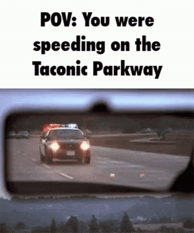Police Car Driving Down Highway GIF