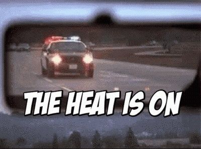 Police Car Driving The Heat Is On GIF