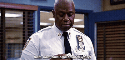 Police Man Saying Hmm Hmm Hmm Hmm Hmm Laughing GIF