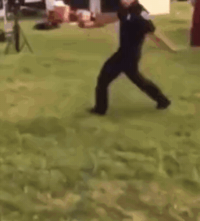 Police Officer Holding Fire Extinguisher GIF