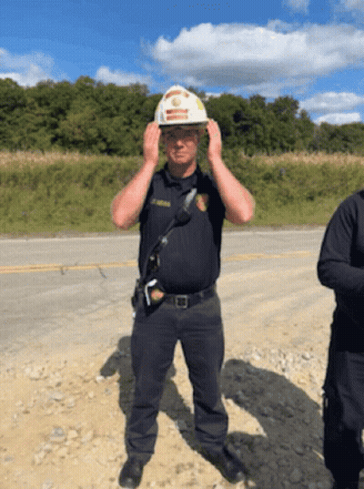 Police Officer In Hard Hat Adjusting Helmet GIF