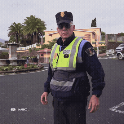 Police Officer In Yellow Vest Saying Policia Local GIF