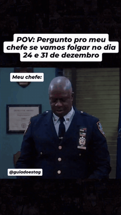 Police Officer Laughing Before Flag GIF