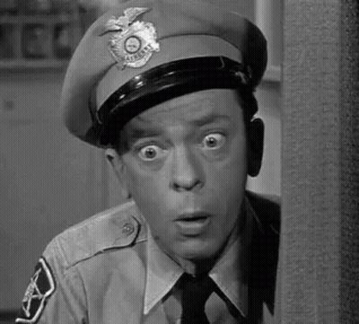 Police Officer Making Funny Face GIF