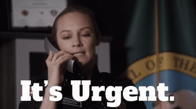 Police Officer On Cell Phone Saying It's Urgent GIF