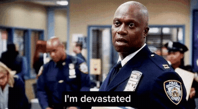 Police Officer Standing In Front Of Group GIF