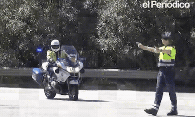 Police Officer Standing Next To Motorcycle GIF