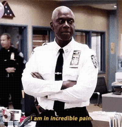 Police Officer Standing With Arms Crossed GIF