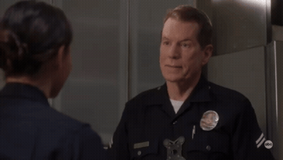 Police Officer Thumbs Down To Woman GIF