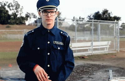 Police Officer With Glasses And Police Uniform GIF