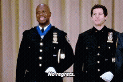 Police Officer With Medal Saying No Regrets GIF