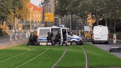 Police Officers Getting Out Of Van GIF