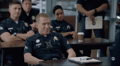 Police Officers Sitting In Classroom With ABC Logo GIF