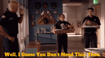 Police Woman Holding Food Box GIF