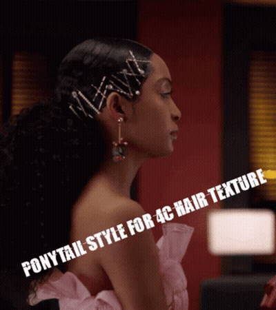 Ponytail Style For 4C Hair Texture Is Shown On A Woman 'S Hair GIF