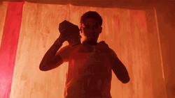 Pooh Shiesty Against The Light Holding Chain GIF