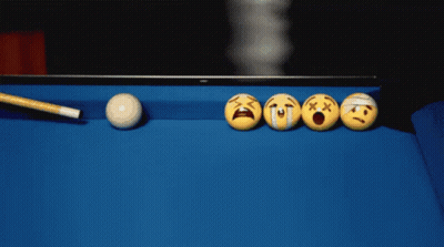 Pool Balls With Smiley Faces On Them Are Lined Up On A Table GIF
