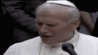 Pope Talking Into Microphone With White Hat GIF