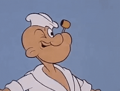 Popeye The Sailor Is Wearing A Bathrobe And Holding A Hammer In His Mouth In A Cartoon . GIF