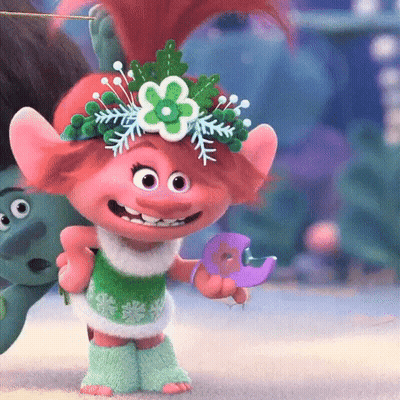 Poppy From Trolls Is Wearing A Flower Crown And Holding A Bird . GIF