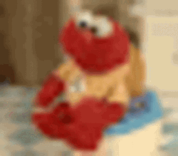 Poseidon's Kiss Baby Elmo GIF
