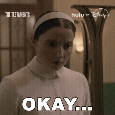Poster For The Testaments Woman In White Headband Saying Okay GIF