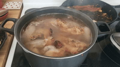 Pot Of Soup Cooking On Stove GIF