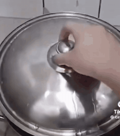 Pot Of Stew Cooking On Stove GIF