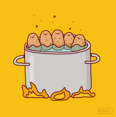 Potatoes Are Boiling In A Pot With Flames Coming Out Of The Pot GIF