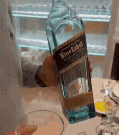 Pouring Blue Label Whiskey Into Glass GIF