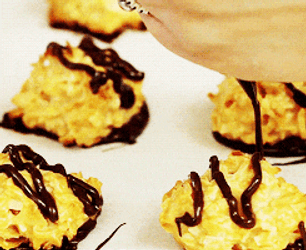 Pouring Chocolate Topping On Macaroons GIF