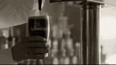 Pouring Guinness Into Glass From Tap GIF
