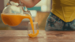Pouring Juice Overflow GIF