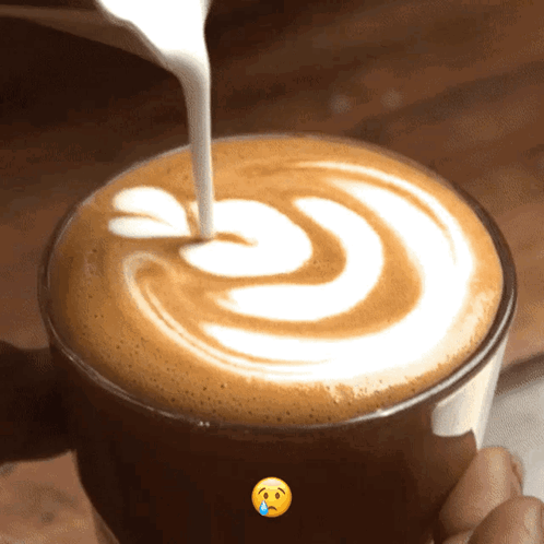 Pouring Milk Into Coffee With Crying Face GIF