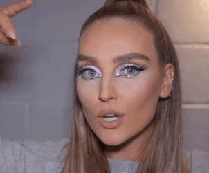 Pouting Perrie Edwards With Pony Tail GIF