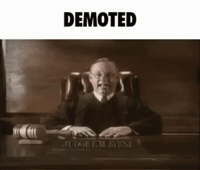 Power Ranger Holding Device Saying Looks Like You've Been Demoted GIF