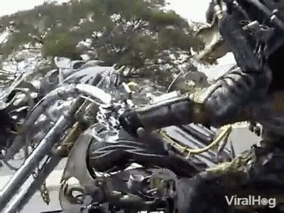 Predator Statue Riding Motorcycle GIF