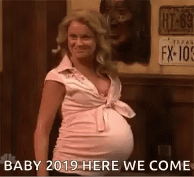 Pregnant Woman In Pink Shirt GIF