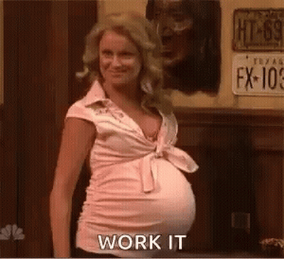 Pregnant Woman In Pink Shirt Saying Work It GIF