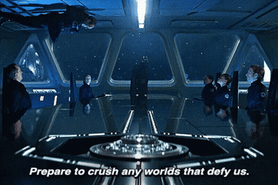 Prepare To Crush Any Worlds That Defy Us Is Written Above A Group Of People GIF