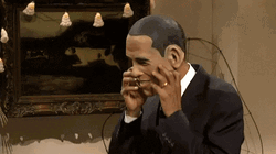 President Barack Obama Taking Off Mask