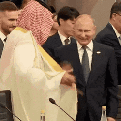 President Putin Hand Shakes Saudi Arabia's Crown Prince