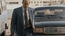 President Putin Walking With Briefcase And Shakes Hand GIF