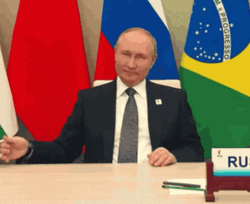 President Vladimir Putin Raised And Sip Coffee