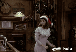 Pretty Girl Jumping While Clapping On Xmas GIF