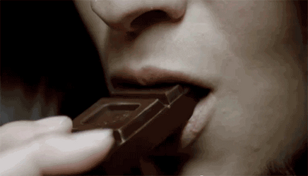 Pretty Lady Speed Chomping On Chocolate GIF