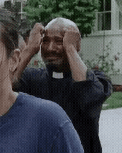 Priest Crying Beside Man GIF