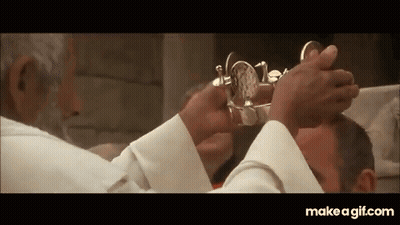 Priest Cutting Man's Head With Scissors In Church GIF